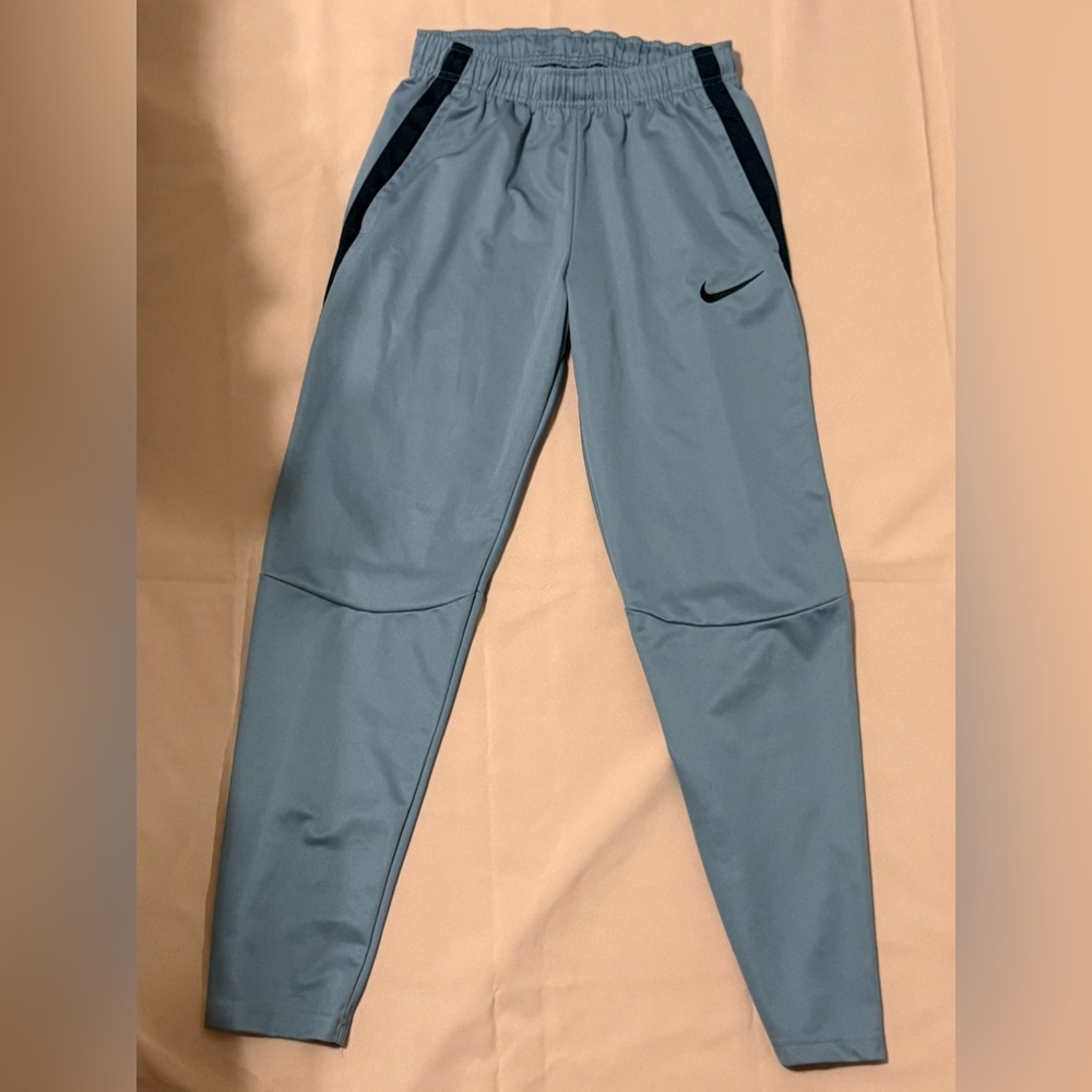 Grey Nike sweatpants